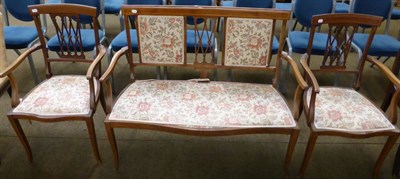 Lot 1283 - An Edwardian inlaid mahogany parlour suite comprising a two seater sofa and two chairs