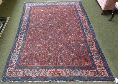 Lot 1287 - Bidjar rug, Persian Kurdistan, the madder field of Herati design enclosed by coral pink borders...