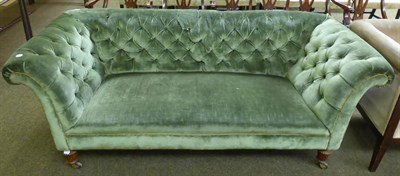 Lot 1290 - A Victorian green upholstered Chesterfield type sofa