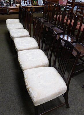 Lot 1292 - Harlequin set of six mahogany dining chairs, with fluted splats and shaped seats raised on...