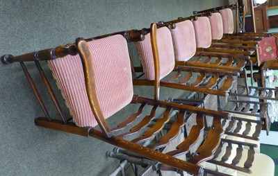 Lot 1295 - A set of six oak ladder back chairs, 18th century style with padded seats (4+2)