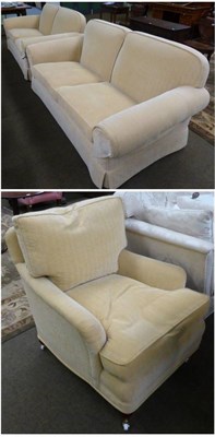 Lot 1297 - Pair of sofas and matching armchair upholstered in gold fabric