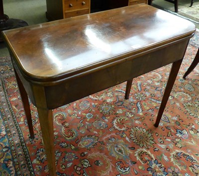 Lot 1302 - A 19th century mahogany fold-over tea table