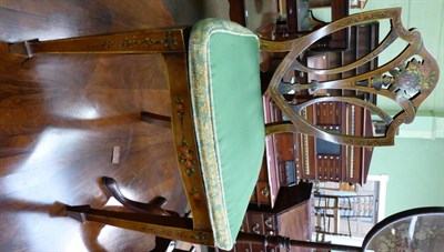 Lot 1304 - A 19th century satinwood painted shield back chair