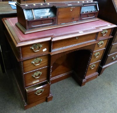 Lot 1312 - A reproduction mahogany desk in the Georgian style with leather top and oak lined drawers, No 1...