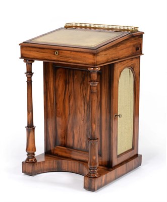 Lot 902 - A Late Regency Rosewood Davenport, 2nd quarter 19th century, with a brass pierced three-quarter...