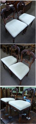 Lot 1316 - A set of six carved oak dining chairs