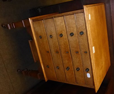 Lot 1318 - A light oak specimen cabinet converted from a canteen with five drawers on square legs