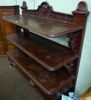 Lot 1331 - A Victorian mahogany three tier buffet