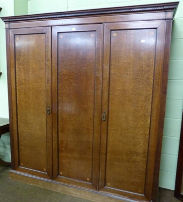 Lot 1333 - A mahogany and satinwood bonded triple door wardrobe, 191cm wide