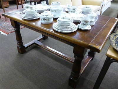 Lot 1336 - A solid oak Jacobean style dining table