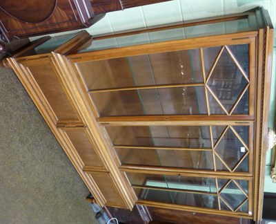 Lot 1340 - A glazed mahogany display cabinet