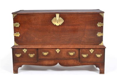 Lot 905 - An 18th Century Mahogany Chest on Stand, with engraved brass strapwork and hinged lid, the base...