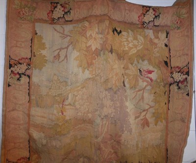 Lot 1366 - A wall tapestry panel in the Aubusson style in mainly peach and brown threads, 135cm by 185cm