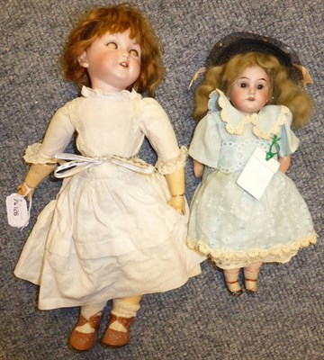 Lot 1390 - German bisque head character doll inscribed '5' with pierced ears, sleeping blue eyes, wig, jointed