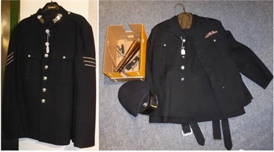 Lot 1404 - A post Second World War police uniform - three tunics, waistcoat and pair of trousers, police...