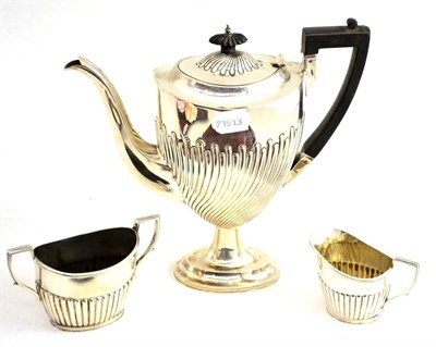 Lot 11 - A silver coffee pot, sugar bowl and cream jug