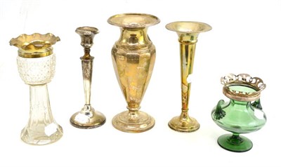 Lot 20 - A silver candlestick, two silver mounted glass vases and two silver pedestal vases