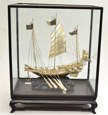 Lot 30 - A Chinese export white metal model of a junk, with a presentation case