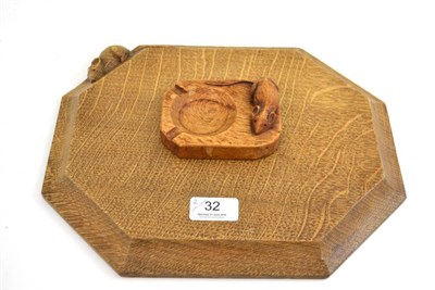 Lot 32 - A 1950's Robert 'Mouseman' Thompson oak bread board, with carved mouse signature; and a Robert...
