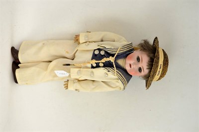 Lot 35 - Schoenau & Hoffmeister bisque socket head doll, impressed 1923, 3.5, with brown wig, sleeping...