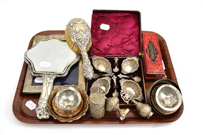 Lot 57 - Silver photograph frame, set of four silver salts and spoons, silver backed mirror, silver...