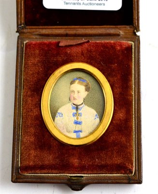 Lot 105 - A 19th century portrait miniature of a young lady, in a gilt metal frame mounted in a velvet...