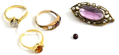 Lot 106 - Two dress rings, an Art Nouveau brooch and a garnet and seed pearl ring (one garnet loose from...