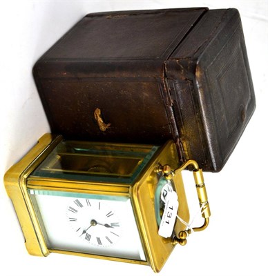 Lot 131 - A French brass carriage timepiece, in a fitted outer case