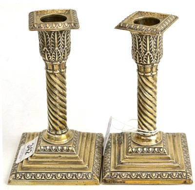 Lot 132 - A pair of silver candlesticks