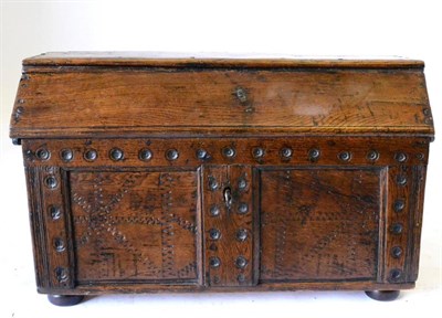 Lot 933 - A Continental Joined Chest, the domed canopy lid above two chip carved fielded panels with...