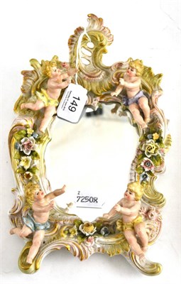 Lot 149 - Dresden mirror mounted with cherubs