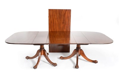 Lot 938 - A Rare Late George III Mahogany Scissor-Action Twin-Pillar Dining Table, early 19th century, of...