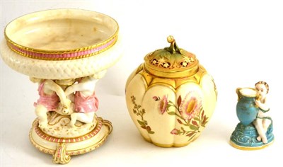 Lot 171 - Worcester figural centrepiece, pot pourri vase and cover and a cherub seated with a vase (3)