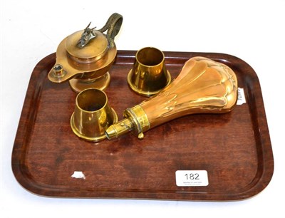 Lot 182 - Copper and brass powder flask, two brass small shell pots and a bronzed inkwell modelled as an...
