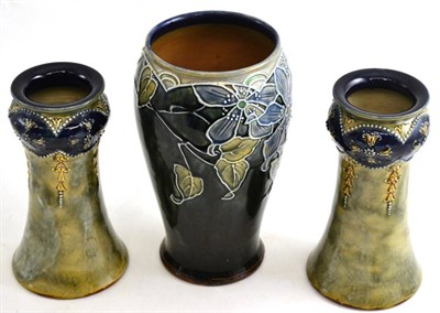Lot 185 - A near pair of Royal Doulton Lambeth stoneware vases and another (3)