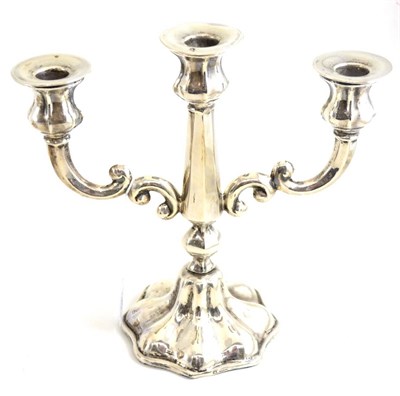 Lot 198 - A silver three branch Greek candlestick