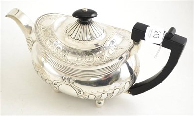 Lot 213 - A silver teapot with ebony handle