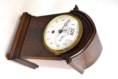Lot 228 - An Edwardian mahogany clock