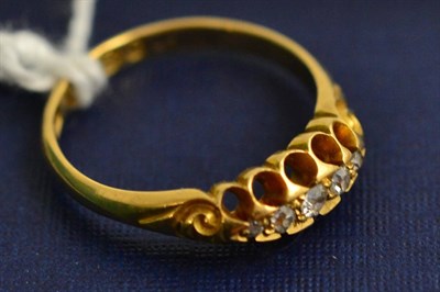 Lot 238 - An 18ct gold diamond five stone ring
