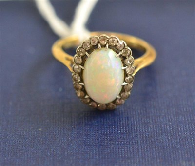 Lot 241 - An opal and diamond cluster ring