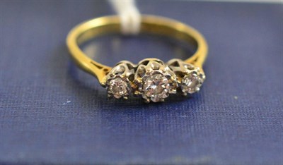 Lot 244 - A diamond three stone ring