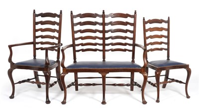 Lot 947 - A Set of Eight George III Style Mahogany Ladder Back Dining Chairs, late 19th century,...