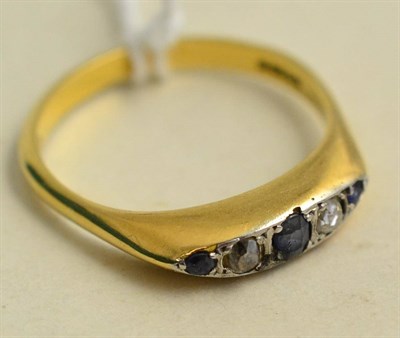 Lot 255 - An 18ct gold sapphire and diamond five stone ring