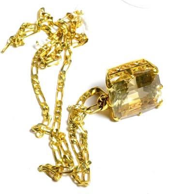 Lot 274 - An 18ct gold smoky quartz pendant and a 9ct gold figaro link chain