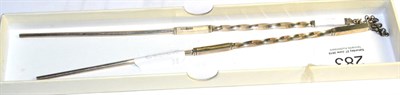 Lot 283 - A pair of Chinese export silver chopsticks, with a barley twist handle and a chain retainer,...