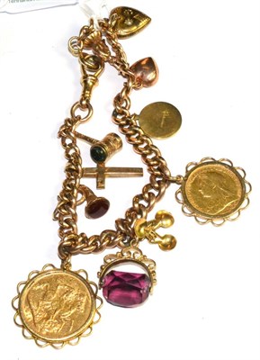 Lot 287 - A charm bracelet hung with eleven charms including 1914 sovereign, a 1898 half sovereign, a...