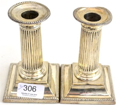 Lot 306 - Pair silver candlesticks