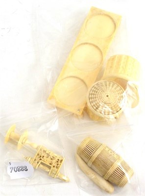 Lot 318 - Mini ivory skittles set, part sewing set, two ivory containers on three piece stand and lucky ivory