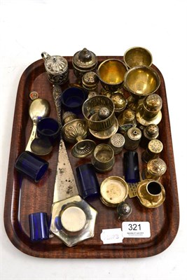 Lot 321 - A tray of assorted silver pepperettes, salts, egg cups, etc